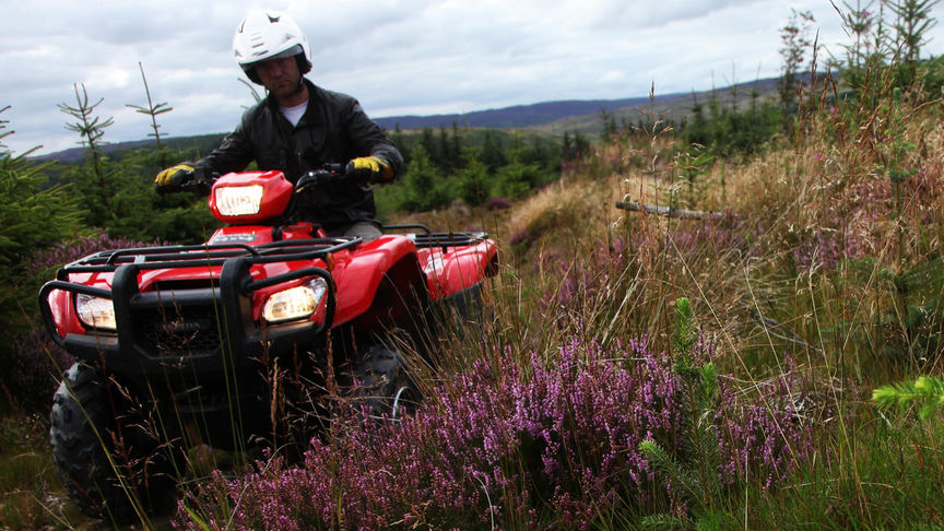 A Honda ATV demonstrating all terrain ability
