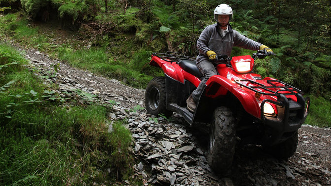 Foreman being used by model, forest location.