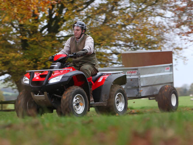 Front three-quarter, left facing Rincon, being used by model, field location.