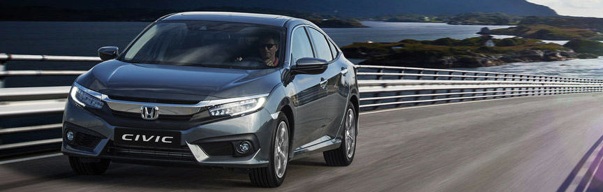 Civic Hatch exterior front three-quarter view, on road.