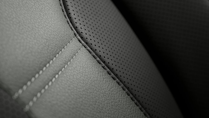 shot of black leather and stitching