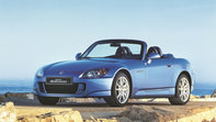 Front three-quarter facing Honda S2000.