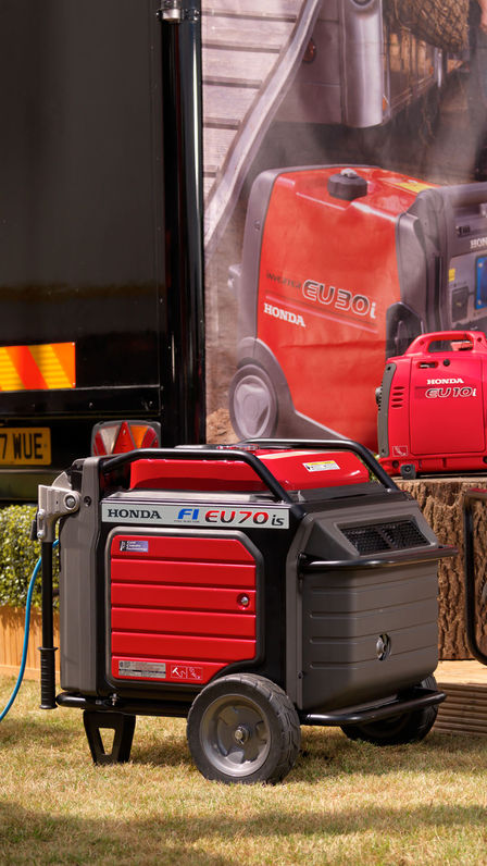 EU70is generator in use, exterior setting.