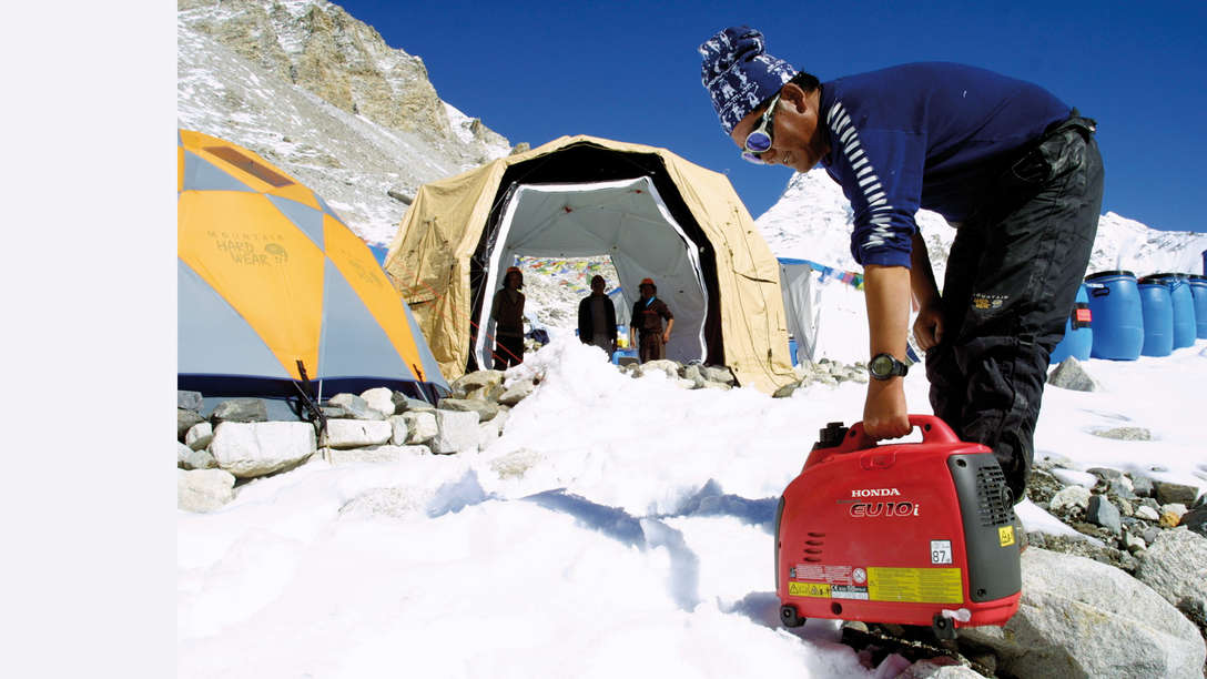 Portable being used by model, mountain location.