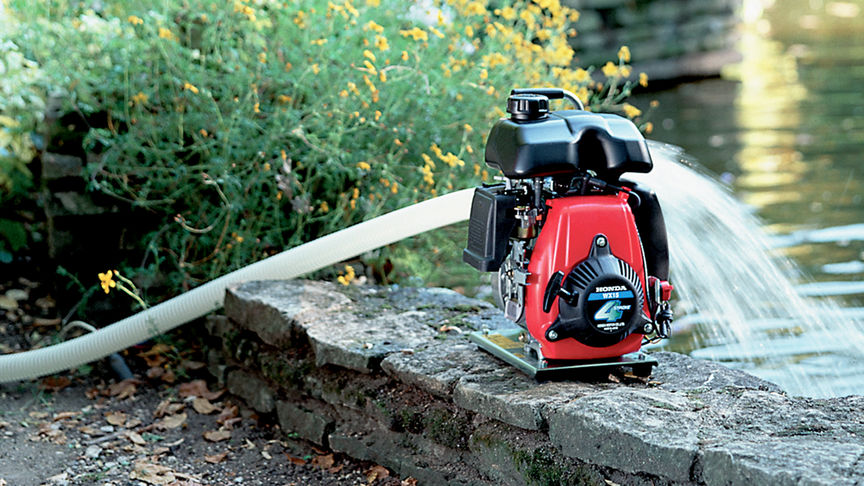 Lightweight water pump, in use, on location.