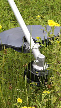 Close up of Brushcutter head, garden location.