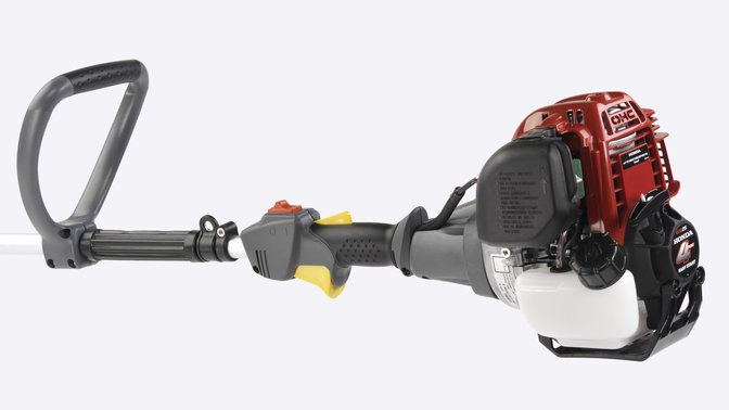 Brushcutter, focusing on engine.