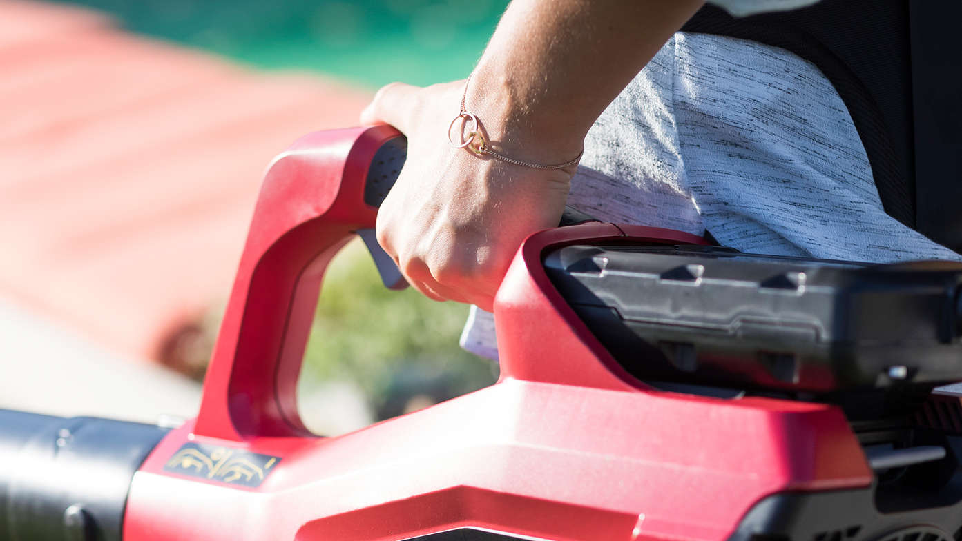 Close up of Honda cordless leafblower adjustable speed control.