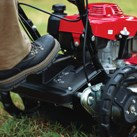 Close up of Grass Cutter foot pedal.
