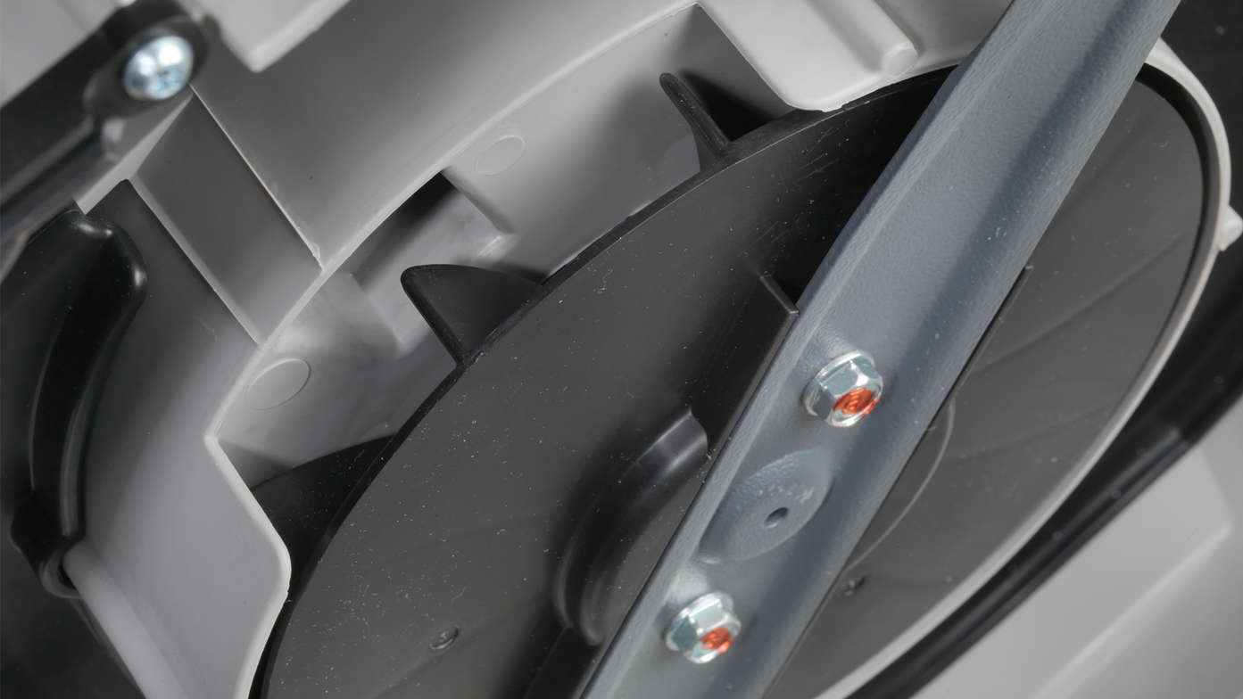 2x Honda HRE lawnmowers, front-threequarter, left facing, garden location.