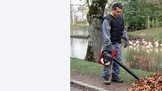 Leafblower being used by model, location.