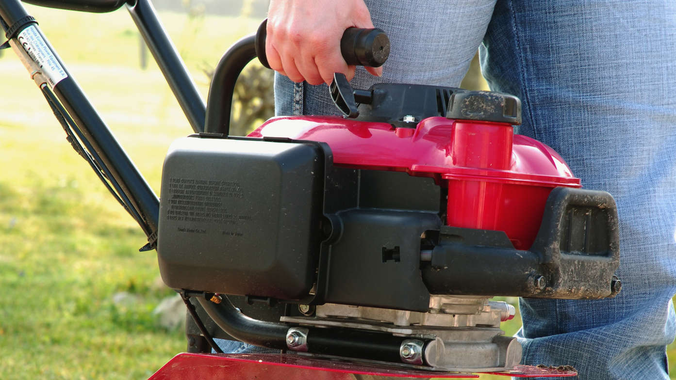 Honda microtillers, close up, focusing on handle.