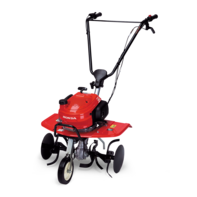 Mini tiller, front three-quarter, left facing.