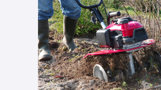 Mini tiller, in use, garden location.