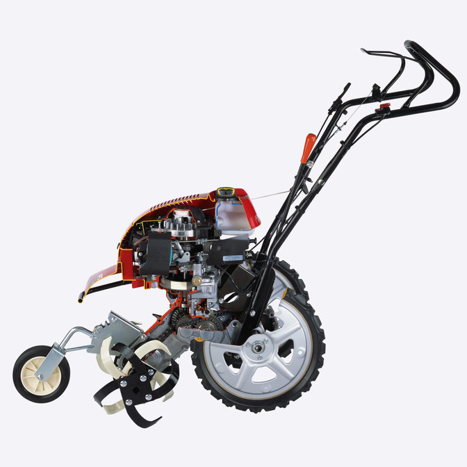 Side view of Rotary tiller, showing inside of engine.