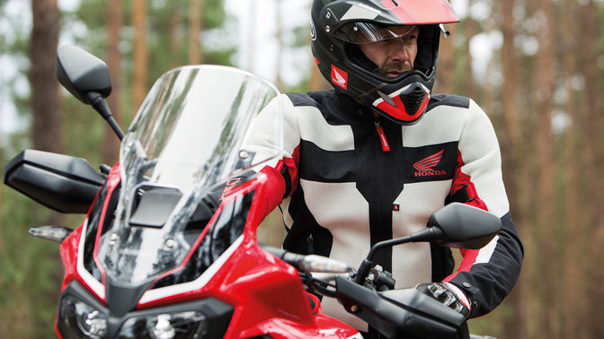 Close-up of man wearing white Honda Spidi Mesh Jacket