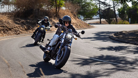 Front view of two Honda motorcycles.