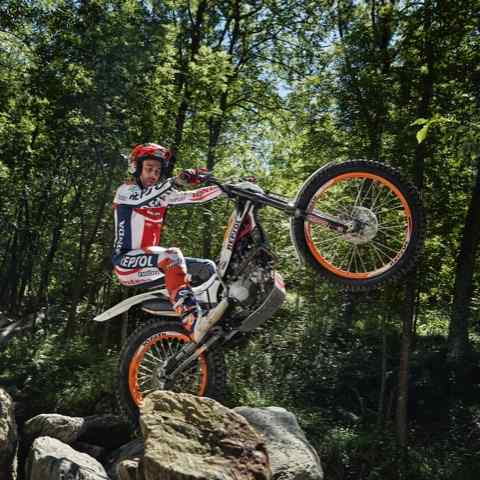 Montesa 4RT Race Replica 3 quarter front right side in mountain landscape