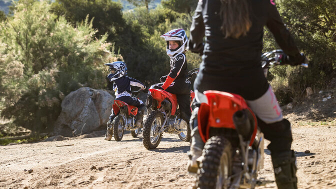 Honda CRF110F off road with young riders