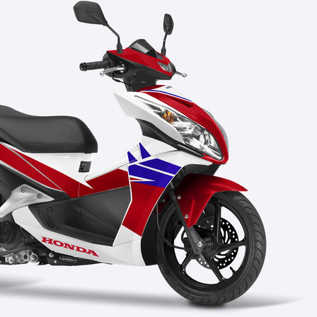 Close-up, studio shot of front section of nsc50r, right-facing.