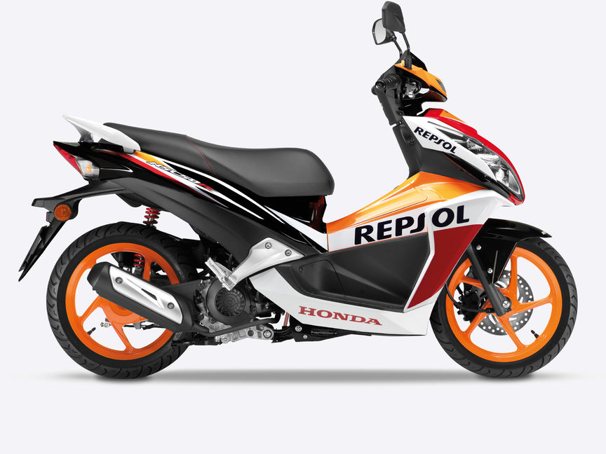 Side on, left-facing, repsol liveried Honda NSC50R.