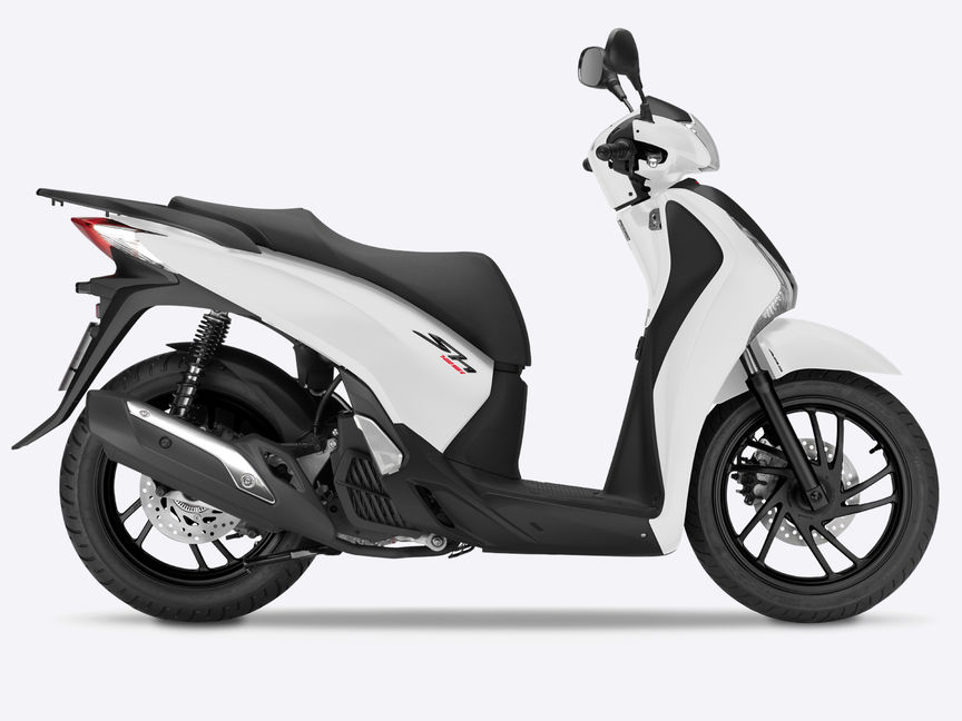 Side on, right-facing red SH150i.