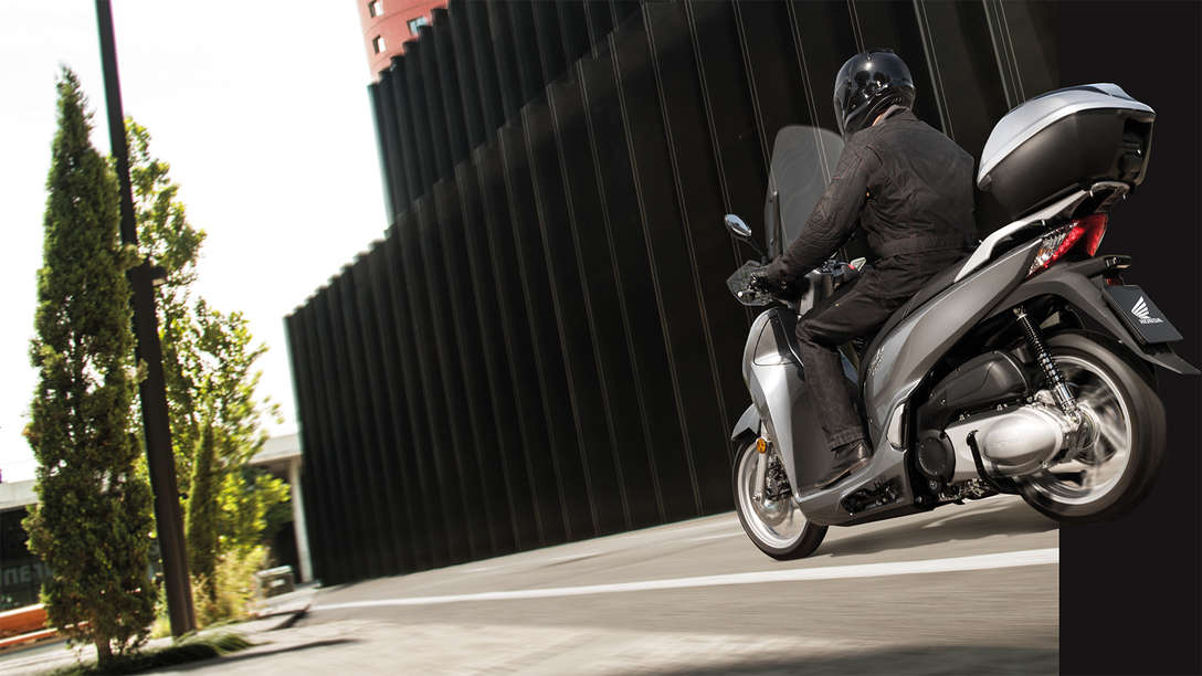 rider on Sh300i facing left