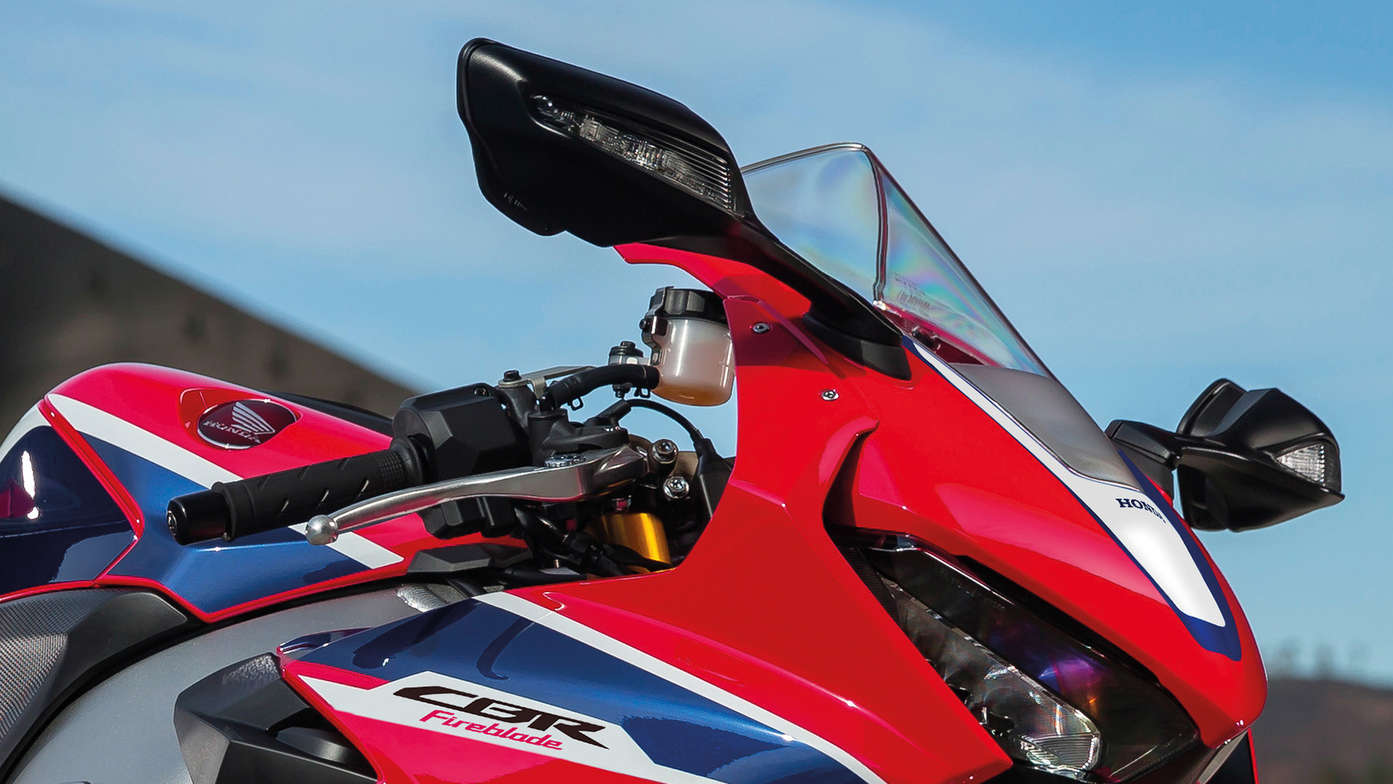 Front three-quarter close up of Honda Fireblade on track.