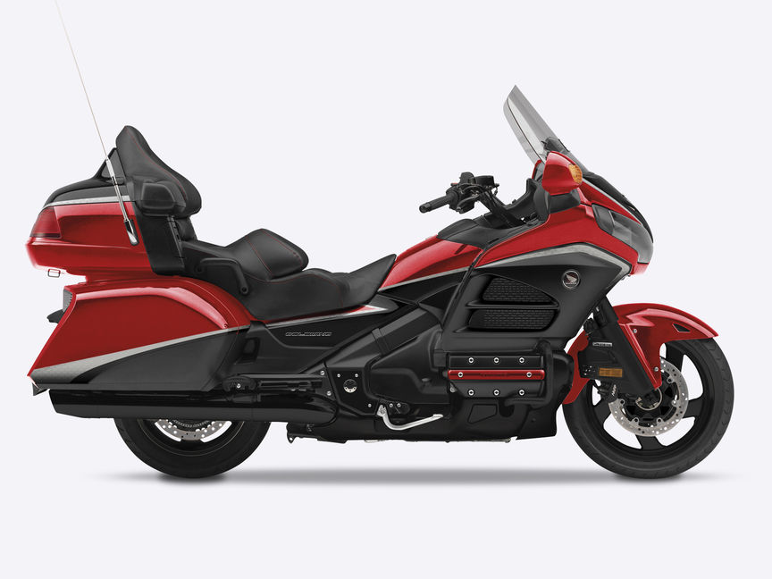Side on, right-facing red Honda Goldwing GL1800.