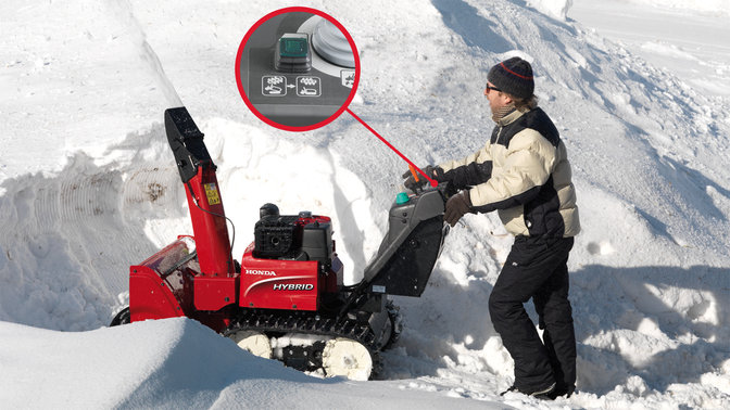 Hybrid being used by model, focusing on reset button, snow location.
