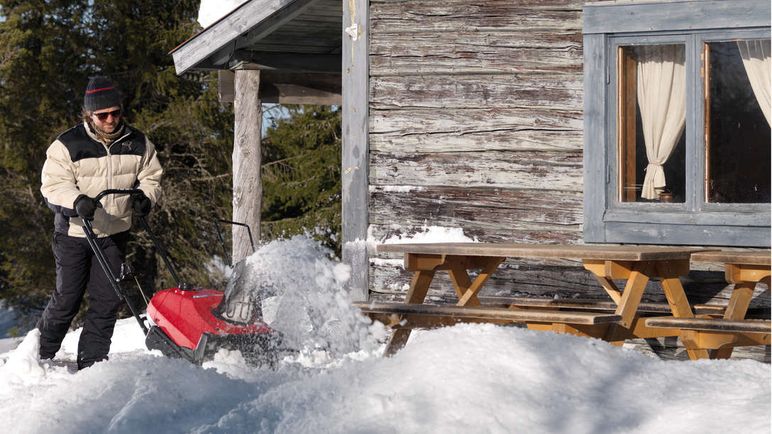 Single-stage being used by model, garden location.